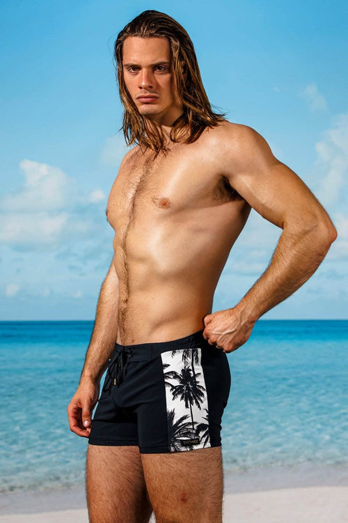 swimsuit model on beach Black Splice Varenna Retro Lycra Swimmer