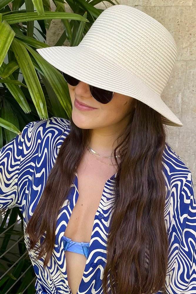 swimsuit model on beach Marina Hat