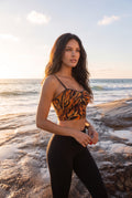 swimsuit model on beach Orange Tiger Bralette