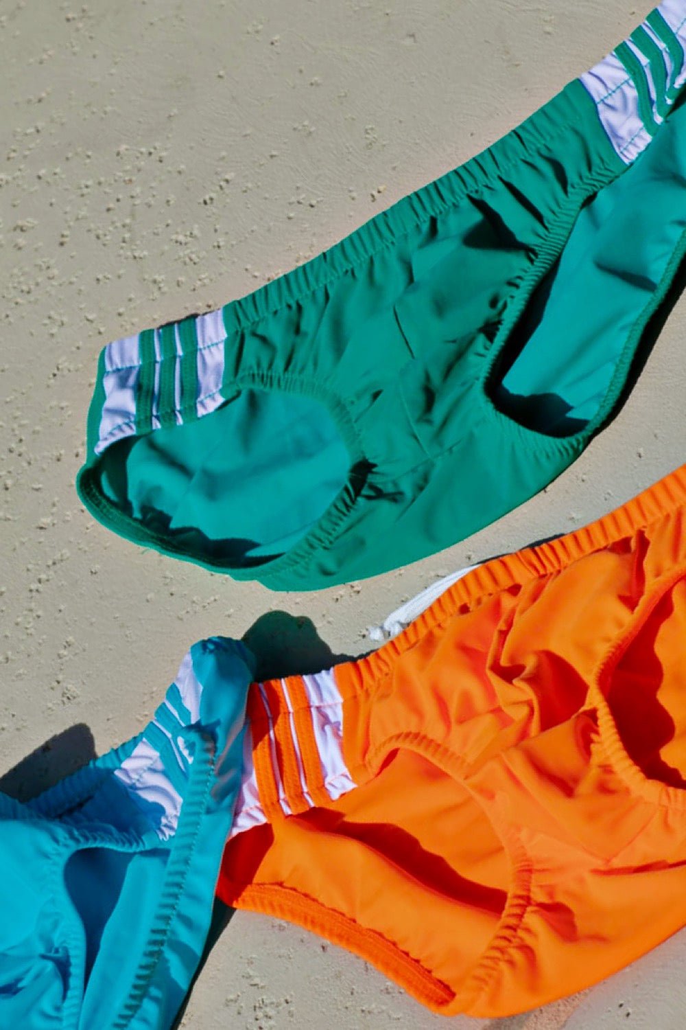 swimsuit model on beach Racer Stripe Brief