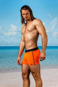 swimsuit model on beach Retro Lycra Swimmer - Orange/Blk