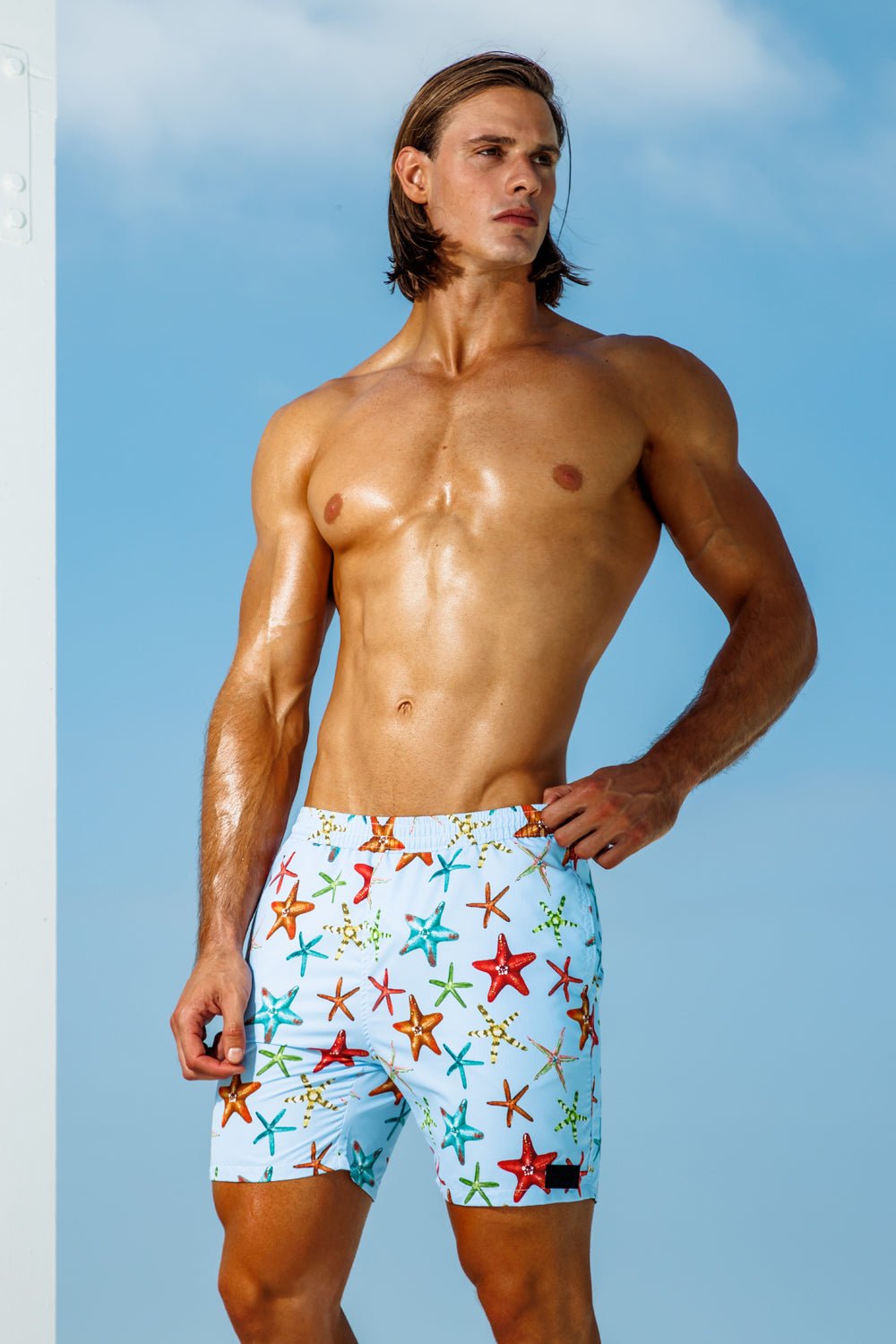 swimsuit model on beach Starfish Midlength Pull-on Trunks